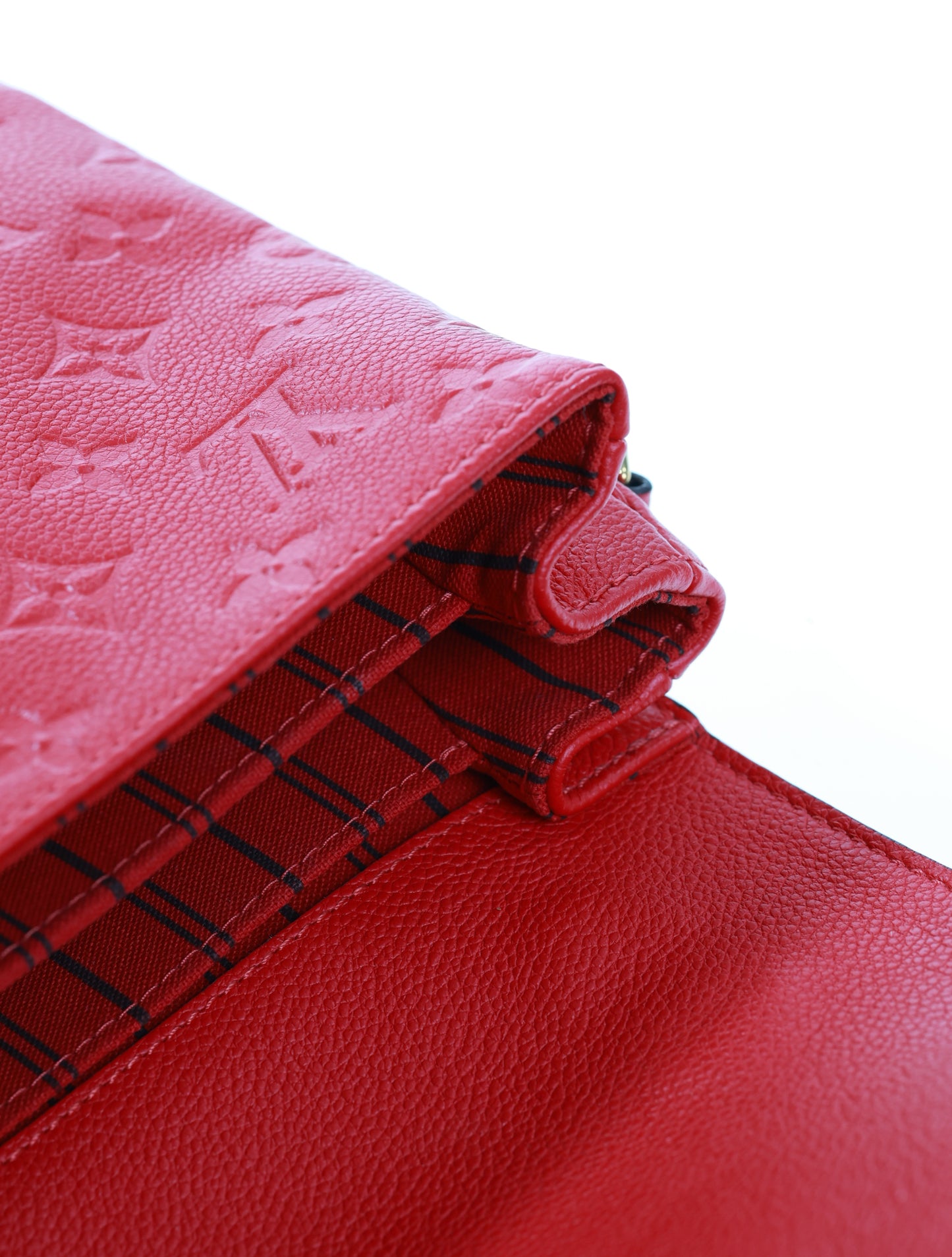 LOUIS VUITTON Pochette Metis Empreinte Red