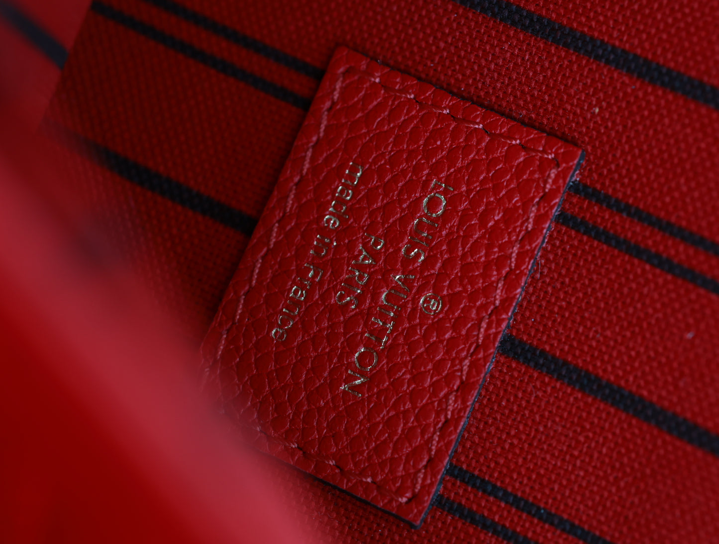 LOUIS VUITTON Pochette Metis Empreinte Red